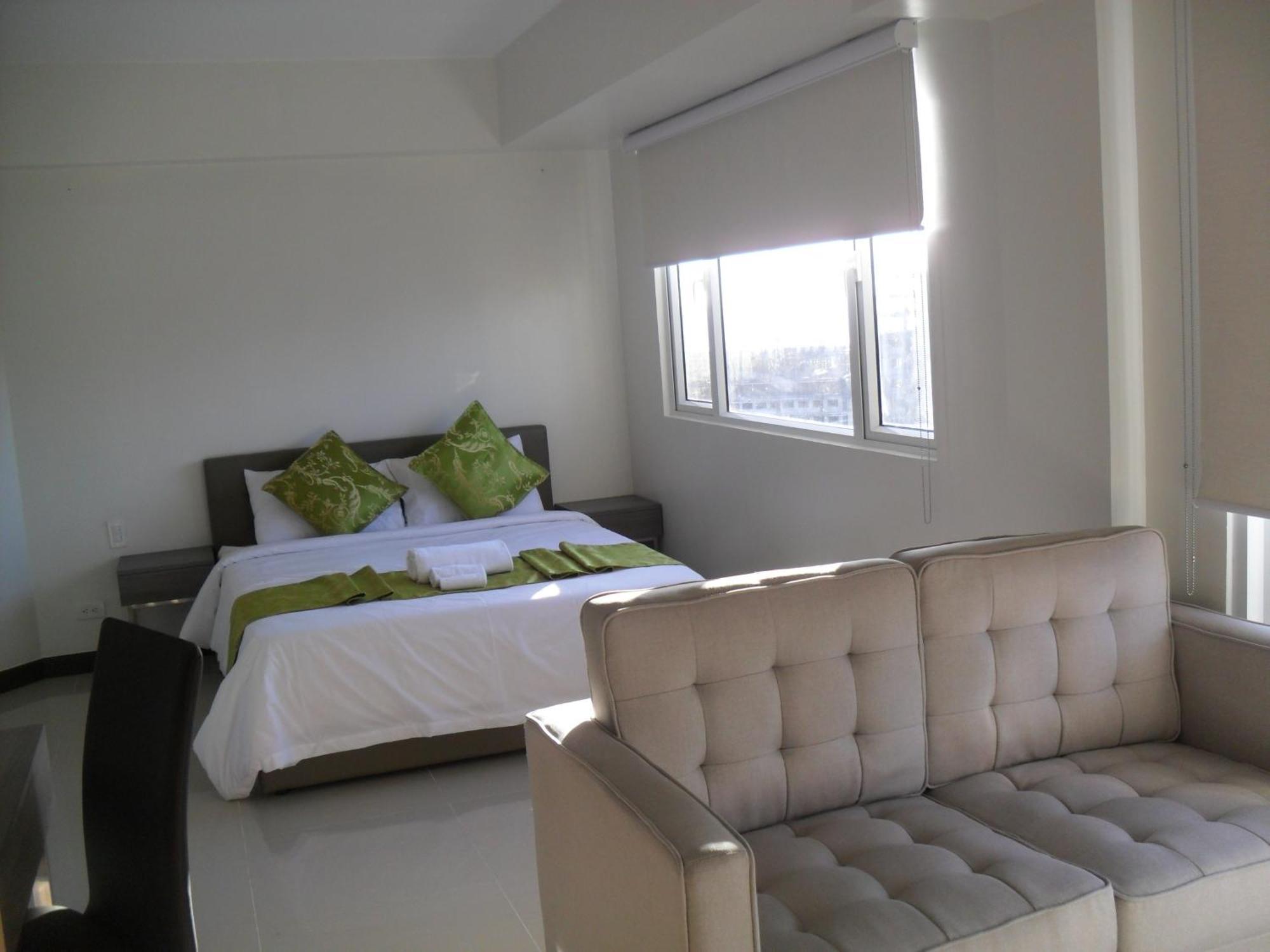 Extremeli Suites Manila Powered By Cocotel Habitación foto